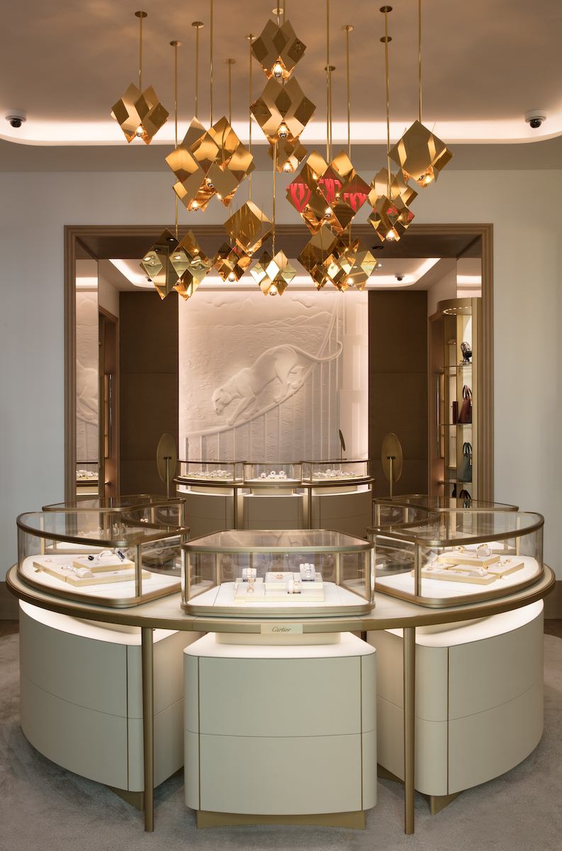 Cartier jewelry display and panther wall design